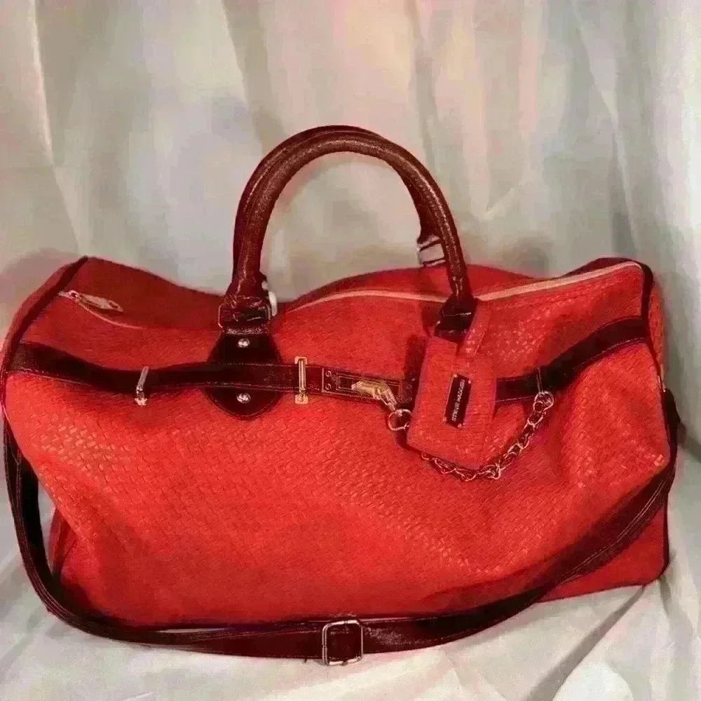 Beautiful Steve Madden Large Duffel Bag, in Stunning Salmon color.